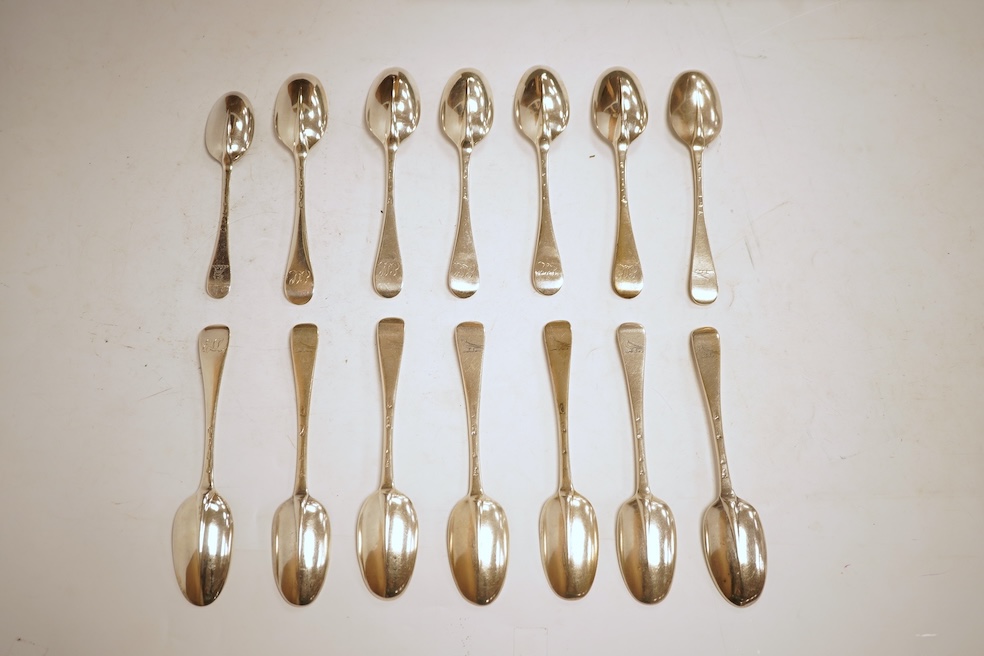 A matched set of seven Queen Anne silver Hanoverian pattern dessert spoons, maker's mark rubbed, five London, 1708, 17.5cm, together with seven other silver base mark Hanoverian pattern dessert spoons, various dates and